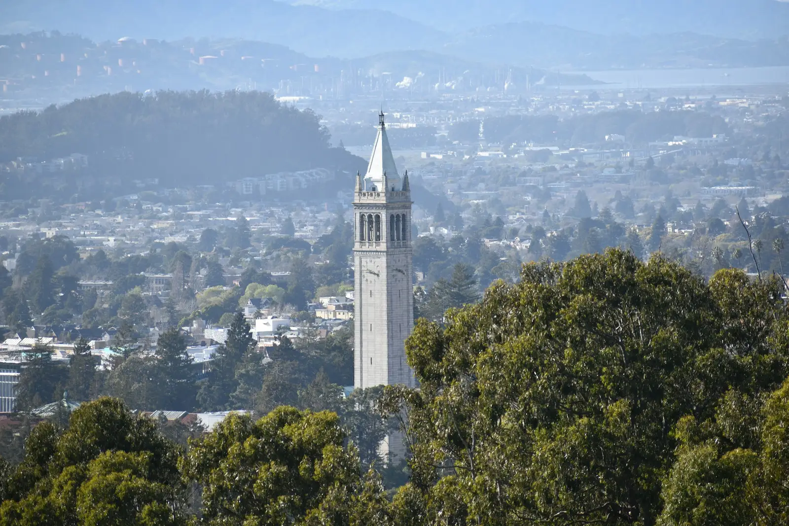 Sather Tower above Berkeley and the bay