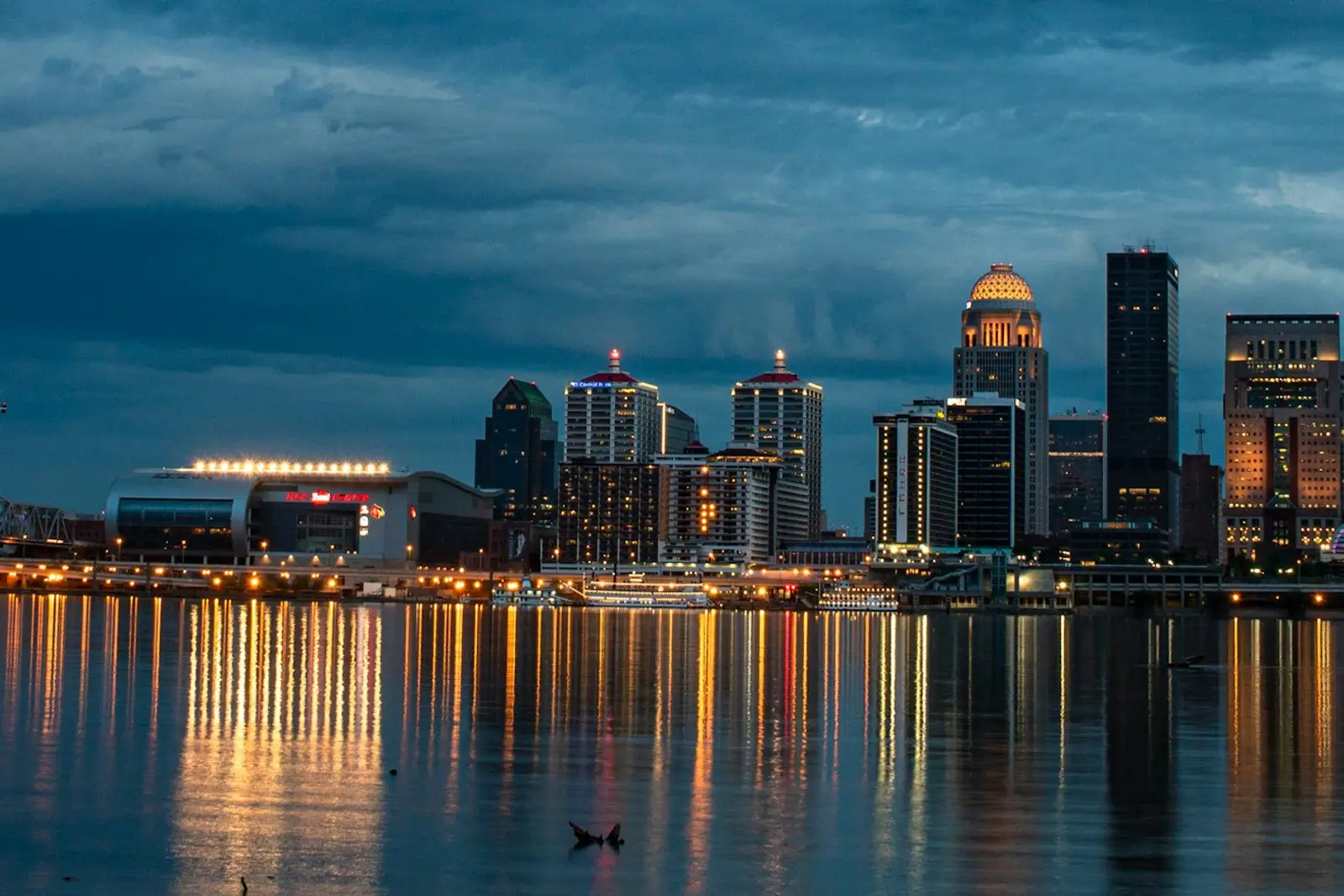 Louisville skyline on the Ohio River at night