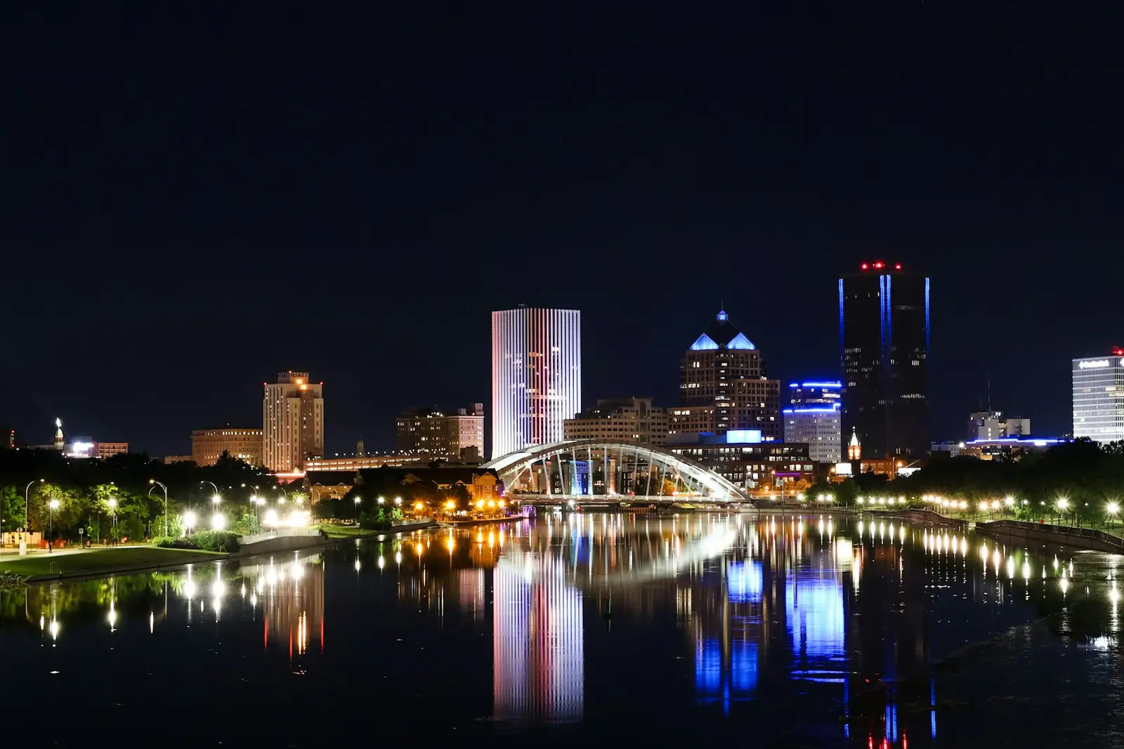 Rochester skyline reflected in the Genesee River at night