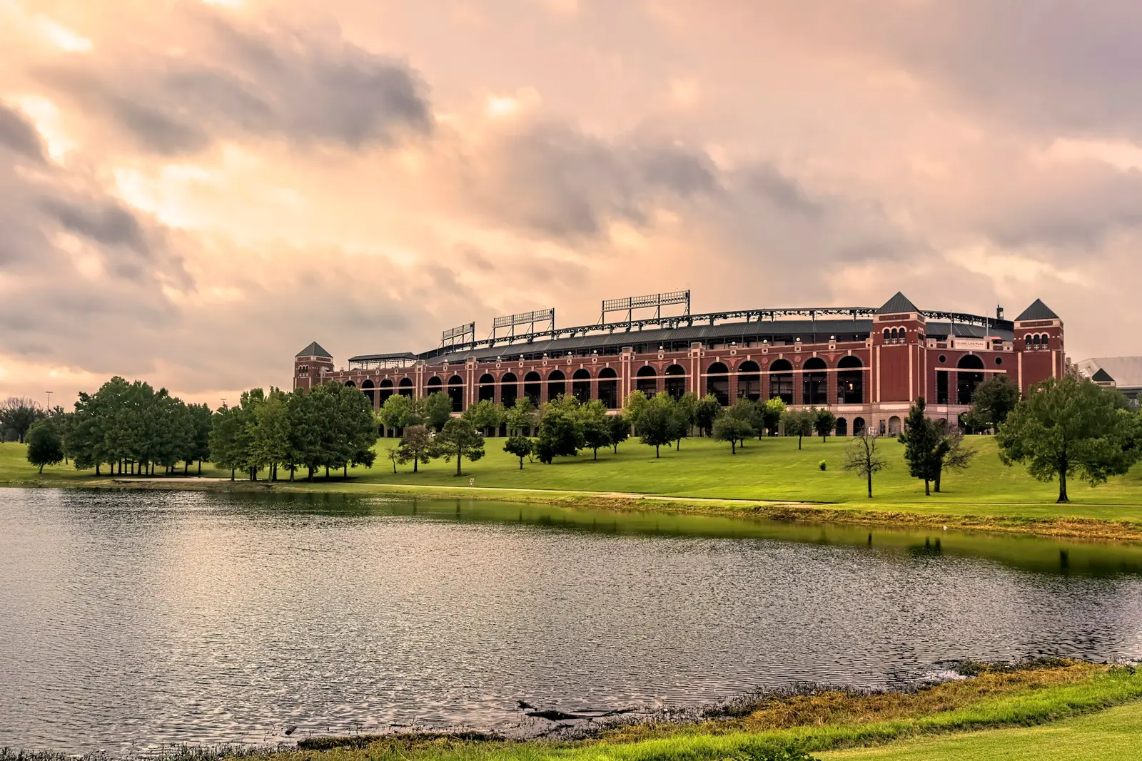 Ballpark and pond in Arlington at sunset